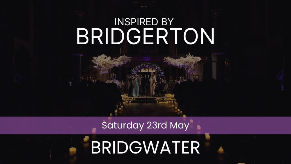 Two musicians playing violin and cello in a decorated indoor setting with candles and floral arrangements. Inspired by Bridgerton Saturday 23rd May Bridgwater
