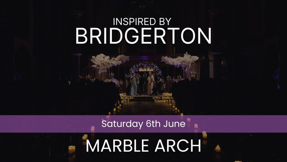 Two musicians playing violin and cello in a decorated indoor setting with candles and floral arrangements. Inspired by Bridgerton Saturday 6th June Marble Arch