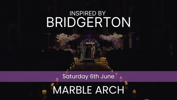 Two musicians playing violin and cello in a decorated indoor setting with candles and floral arrangements. Inspired by Bridgerton Saturday 6th June Marble Arch