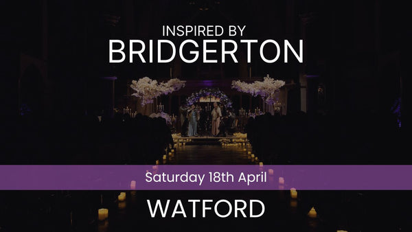 Two musicians playing violin and cello in a decorated indoor setting with candles and floral arrangements. Inspired by Bridgerton Saturday 18th April Watford
